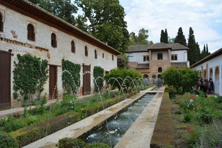 Granada: Alhambra and Generalife Gardens Guided Tour - Cancellation Policy and Duration