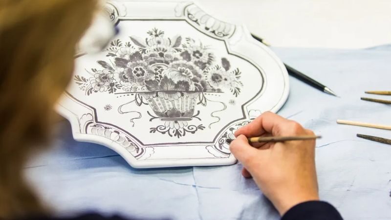 Grand Holland Rotterdam and The Hague Guided Day Tour - Delft’s pottery visit adds craft to the day