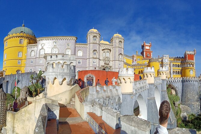 Group to Pena Palace, Sintra (pass by Regaleira) and Cascais - Exploring the Enchanting Regaleira
