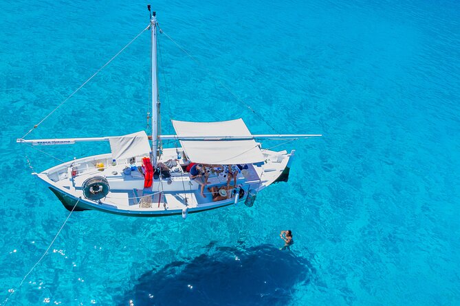 Guided Day by Boat in Carloforte With Snorkelling and Aperitif - Weather and Minimum Travelers