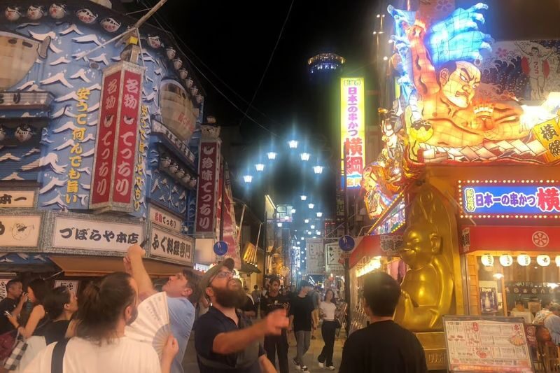 Guided Food Tour with 15 Dishes in Shinsekai, Osaka - Kushikatsu and doteyaki: a hearty start