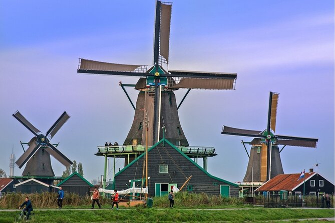 Guided Tour of Volendam, Edam and Windmills With Canal Cruise From Amsterdam - Logistics and Cancellations