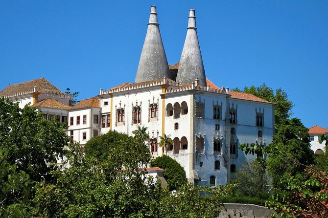 Guided Tour to Sintra Pena Regaleira Roca Boca Do Inferno and Cascais - Cancellation Policy and Traveler Tips