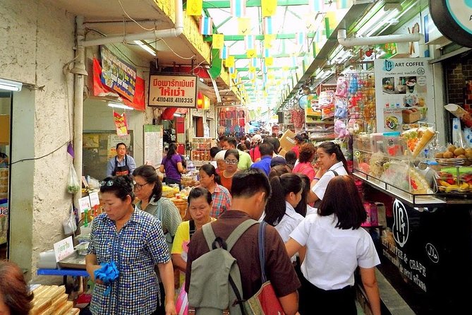 Guided Walking Tour of Grand Palace With Wang Lang Market - Practical Information and Booking Details