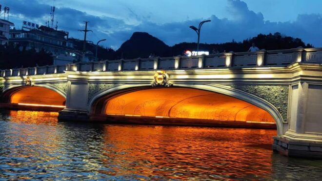Guilin: Four Lakes Night Cruise With Round-Trip Transfer - Cruise Highlights and Activities