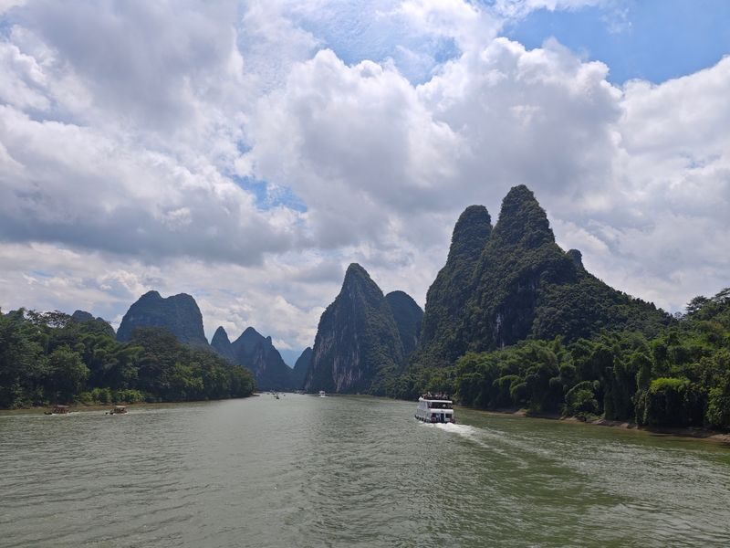 Guilin Li River + Yulong River Bamboo Raft + Impression Liu Sanjie Day Tour (Chartered Tour + Tickets + Li River Three/Four-Star Cruise) - Yulong River: a quieter raft ride