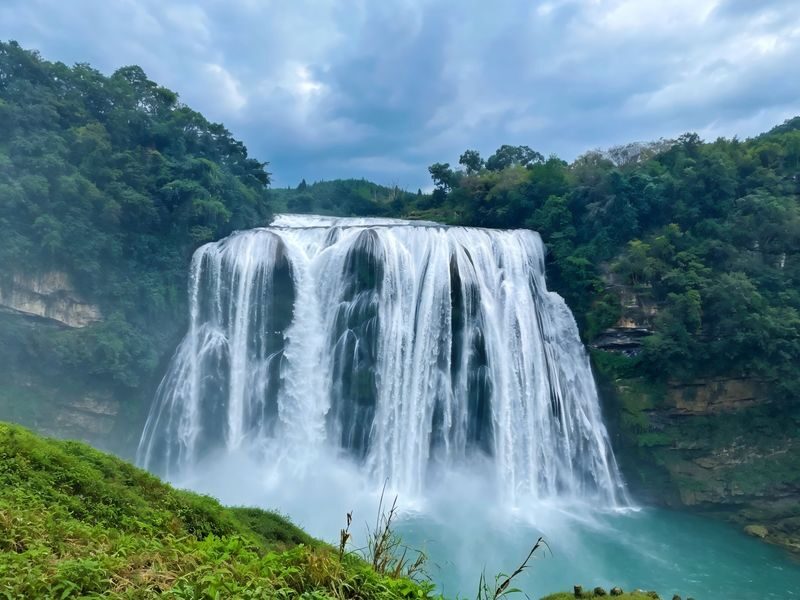 Guiyang Huangguoshu Waterfall & Tianxingqiao Full-Day Tour - The Grand Waterfall and the Water Curtain Cave reservation