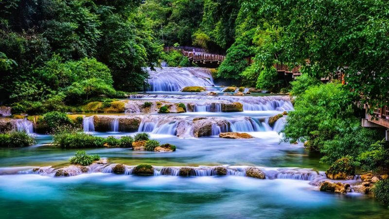 Guiyang Libo Xiaoqikong One-Day Bus Tour - Xiaoqikong Ancient Bridge changes the pace