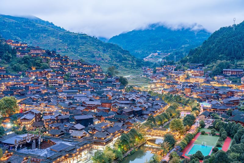 Guiyang Xijiang Qianhu Miao Village Full-Day Cultural Tour - Village scenery, with a commercial side