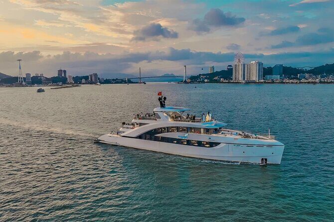 Ha Long Bay Sunset & Luxury Yacht Dinner with City Night Views - Detailed Breakdown of the Itinerary