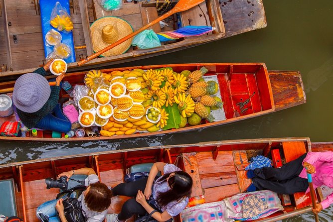 Half Day Bangkok Tour: Maeklong Train Market & Damnoen Saduak Floating Market - Pricing and Booking Options