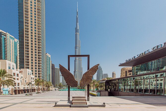Half Day Dubai Tour With at Top of Burj Khalifa and Desert Safari - The Sum Up
