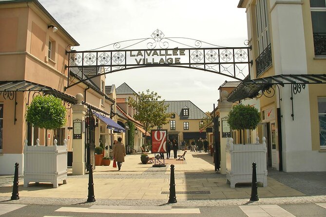 Half Day Private Round Transfer to La Vallée Village From Paris - Pricing and Reservation Details