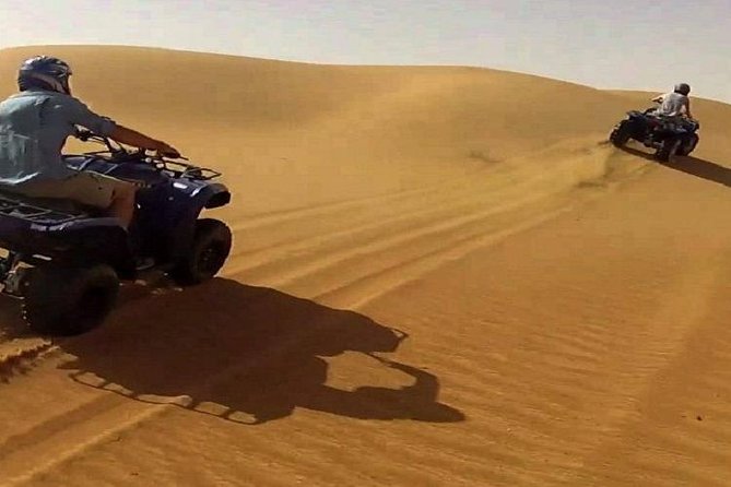 Half-Day Quad Bike Tour in Dubai Dunes With Camel Ride - The Sum Up