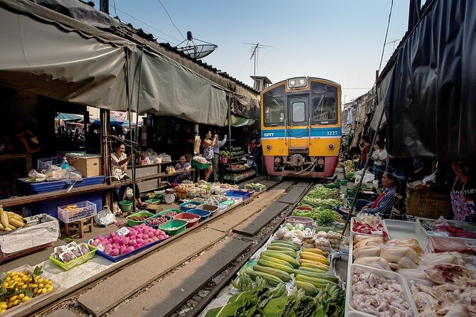 Half Day Railway Market and Damnoen Saduak Floating Market Tour - Traveler Tips for an Authentic Experience