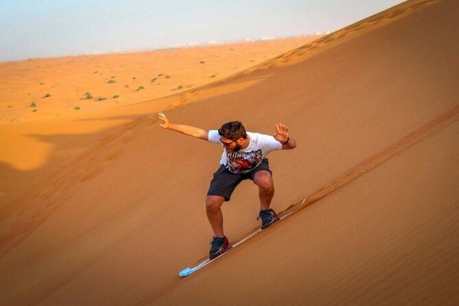 Half-Day Red Dunes by Quad Bike With Camel Ride and Sandboard - Cancellation Policy