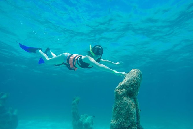 Half Day Sailing Private Catamaran to Isla Mujeres - Common Questions