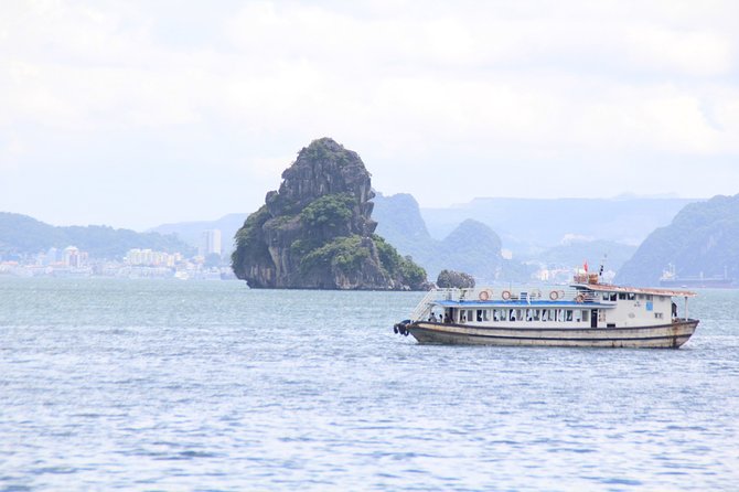 Halong Bay Full Day Cruise Trip: Kayaking, Surprise Cave, Titop Island, Lunch - Common Questions