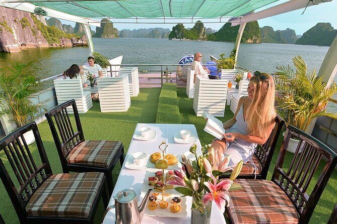 Halong Wonder Bay Cruise 1 Day Tour from Hanoi with Limo Transfer - Activities & Dining: A Culinary and Scenic Feast