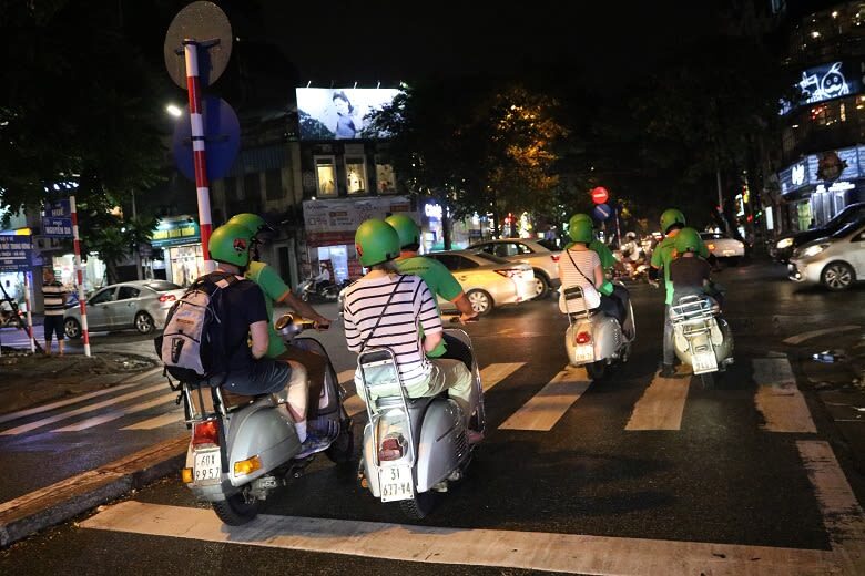 Hanoi After Dark Street Food Tour by Vintage Vespa - Train Street and the city between stops