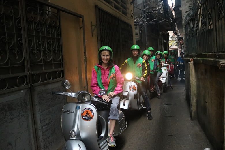 Hanoi After Dark Street Food Tour by Vintage Vespa - Guides who make the ride feel personal
