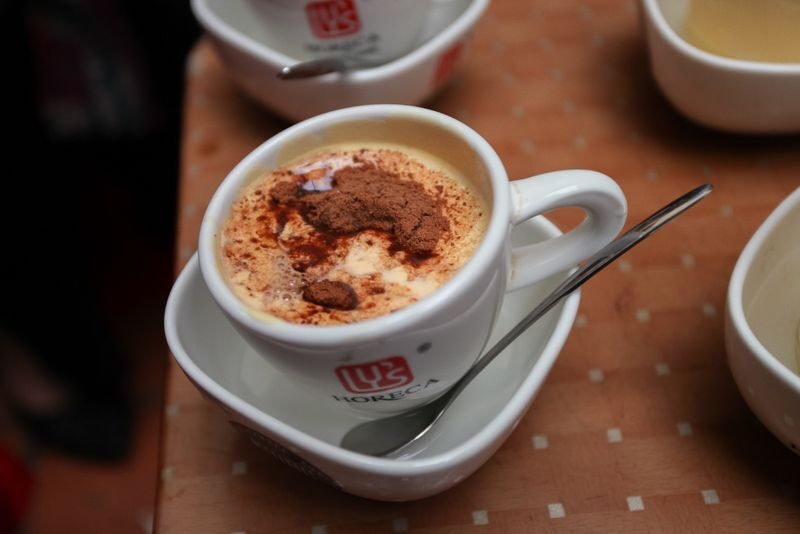 Hanoi Street Food Walking Tour with Water Puppet Show - See Bach Ma Temple and Dong Xuan Market