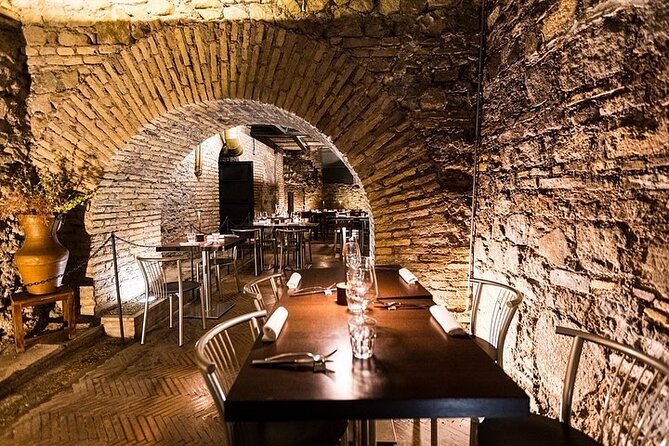 Heart of Rome: Candlelight Wine & Food Tasting in Ancient Ruins - Explore Ancient Ruins