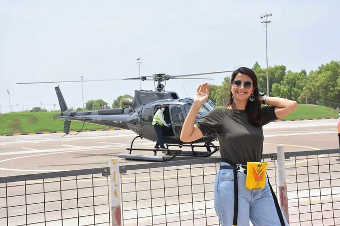 Helicopter Ride Global Village Visit Tour With Private Transfer - Common Questions