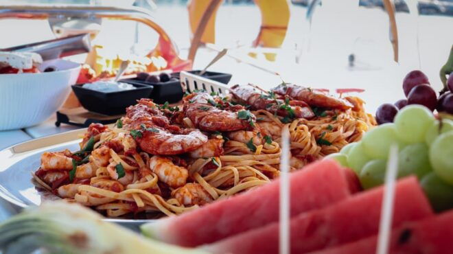 Heraklion: Dia Island Small Group Catamaran Cruise With Meal - Onboard Experience