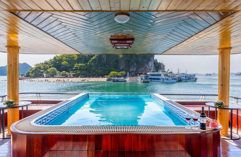 Heritage Luxury Day Cruise: Ha Long Bay Tour with Ti Top & Sung Sot - Sunset snacks and the ride back