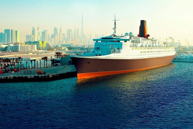 Heritage Tour and Afternoon Tea at Queen Elizabeth 2 Dubai - Enjoy Traditional Tea Delights