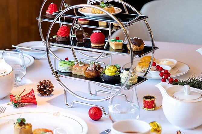 Heritage Tour and Afternoon Tea at Queen Elizabeth 2 Dubai - Common Questions