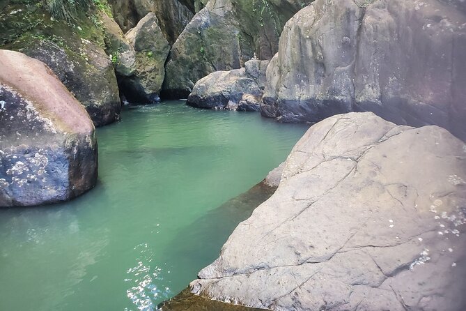 Hidden Waterfall Adventure in Remote Area of El Yunque Rainforest - Weather Conditions and Refund Options