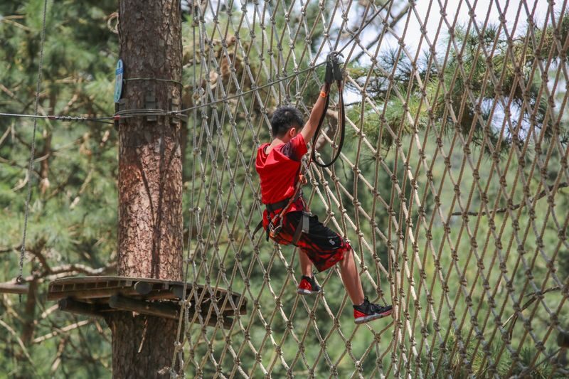 High Rope Course Adventure in Da Lat - Orange and Blue: a steady climb in difficulty
