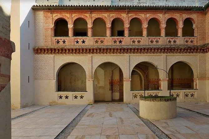 Historical Italica: Half-Day Guided Tour From Seville - Tour Description and Highlights