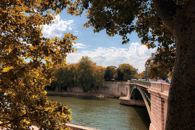 Historical Paris Walking Tour to Vibrant Food Market - Local Landmarks