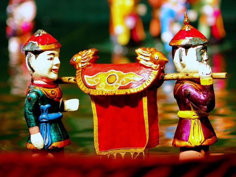 Ho Chi Minh City Golden Dragon Water Puppet & Saigon River Dinner Cruise Night Tour - A water puppet show, then a river evening