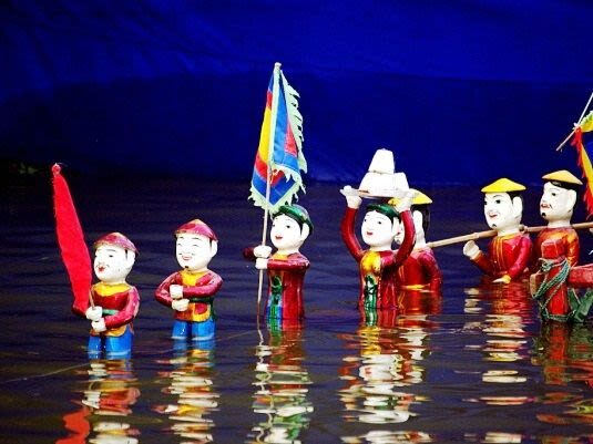 Ho Chi Minh City Golden Dragon Water Puppet & Saigon River Dinner Cruise Night Tour - What to expect at Golden Dragon Water Puppet Theatre