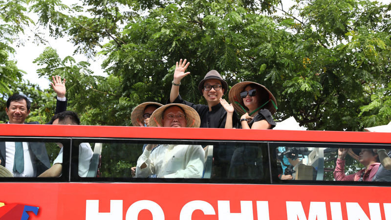 Ho Chi Minh City Highlights & Chinatown by Hop-On Hop-Off Bus with Guide - A live guide, with audio as another option