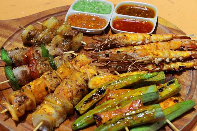 Ho Chi Minh City: Private Street Food Night Walking Tour - Local Street Food Delights