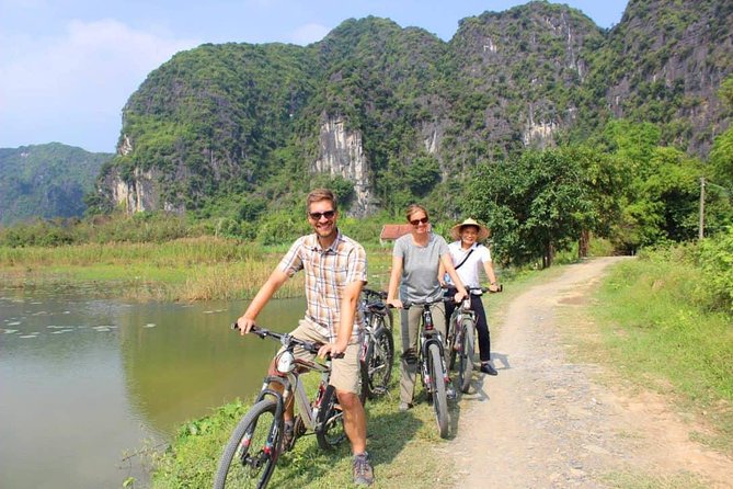 Hoa Lu - Tam Coc Luxury Small Group 1D: Limousine Bus, Biking, Boat Trip, Lunch - The Sum Up
