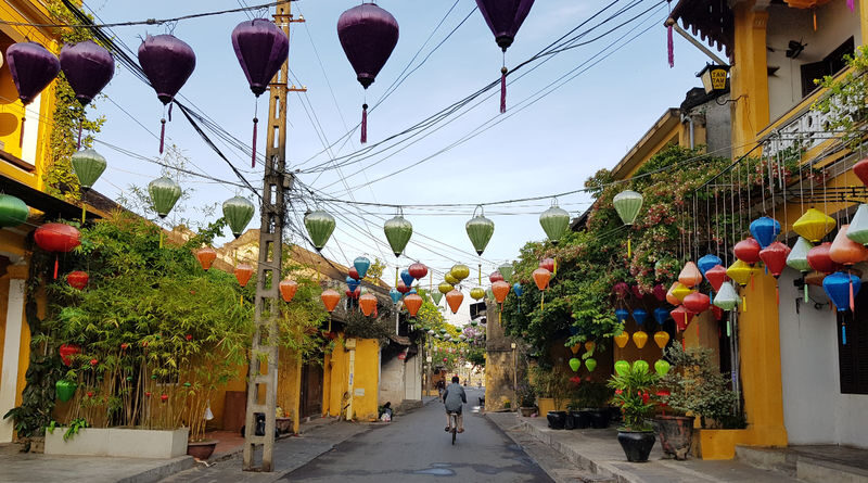 Hoi An City Tour and Coffee Tasting from Da Nang - A performance house and a market between monuments