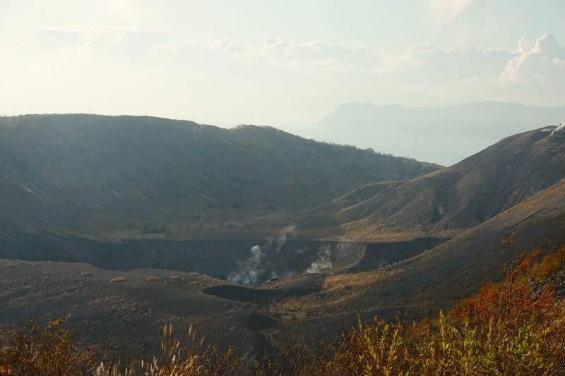 Hokkaido | Lake Toya, Noboribetsu Jigokudani (Hell Valley), Mount Usu Day Trip with Gourmet Food & Stunning Views | Depart from Sapporo - Showa-shinzan and Mount Usu: two volcanoes, one decision