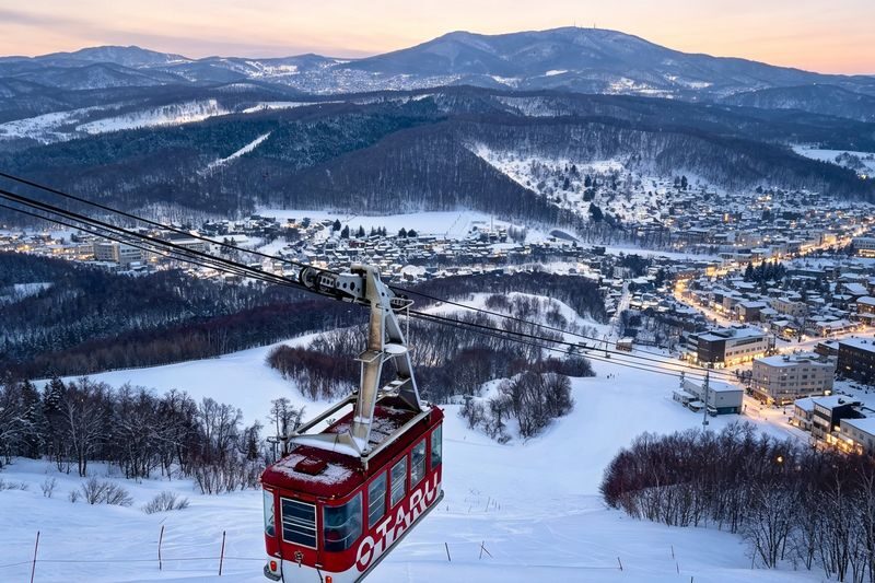 Hokkaido Otaru 1-Day Tour: Cape Kamui, Blue Cave, Mount Tengu, Hill of the Buddha (Multiple routes and languages available) - Blue Cave boat ride: scenic, but with a changed route