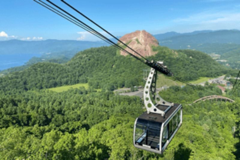 Hokkaido Regular Sightseeing Bus: D Lake Shikotsu & Lake Toya Round Trip Course (Audio Guide Course) - Mt. Usu by ropeway: admission is part of the plan