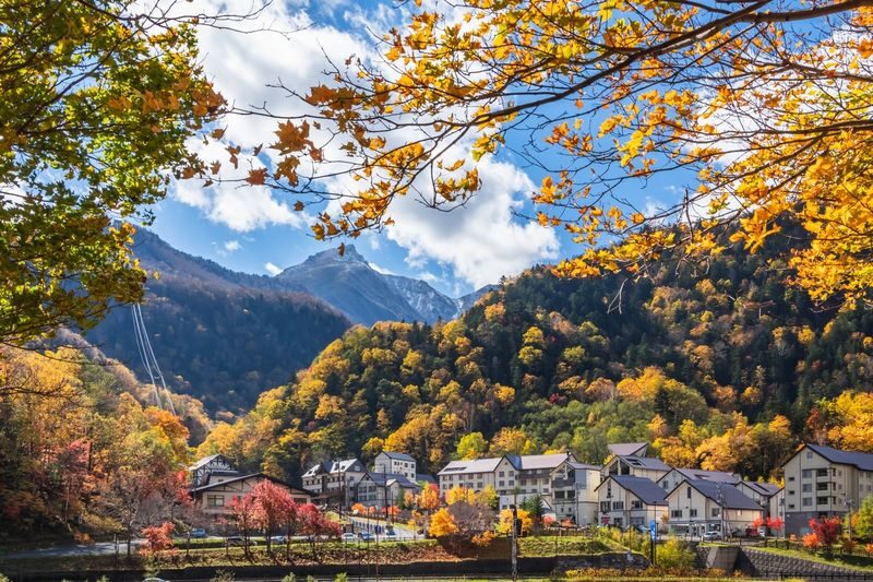 Hokkaido Sounkyo Gorge Autumn Foliage Day Trip: Sounkyo Onsen Town, Ginga & Ryusei Waterfalls, Mt. Kurodake Ropeway, and - Sounkyo makes the long ride worthwhile