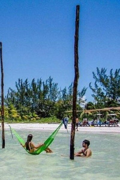 Holbox Tour From Cancun and Tulum With Boat Included - Duration and Cancellation