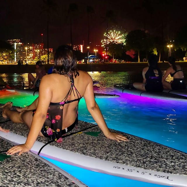 Honolulu: Fireworks Glow and Flow Yoga Class - Honolulu Skyline at Dusk to Night