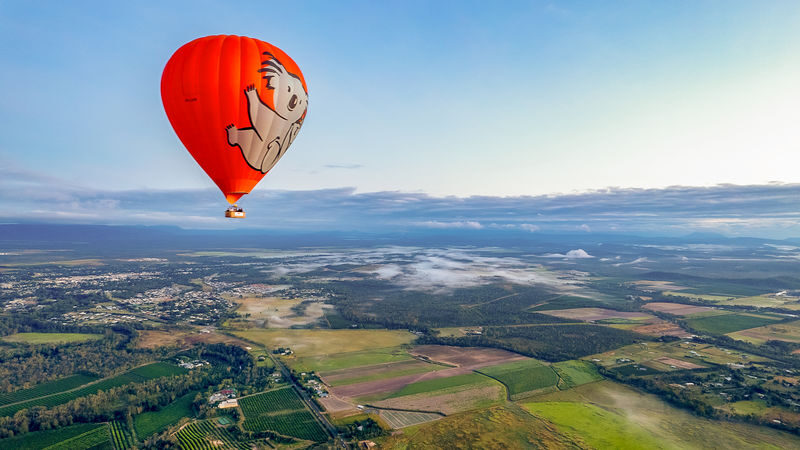 Hot Air Balloon Experience in Cairns and Port Douglas - From a dark pickup to a sky full of balloons