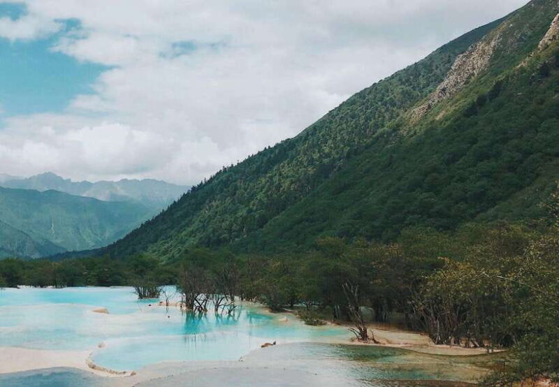 Huanglong Scenic Area: Explore Stunning Five-Colored Ponds - Authentic Experiences and Reviews